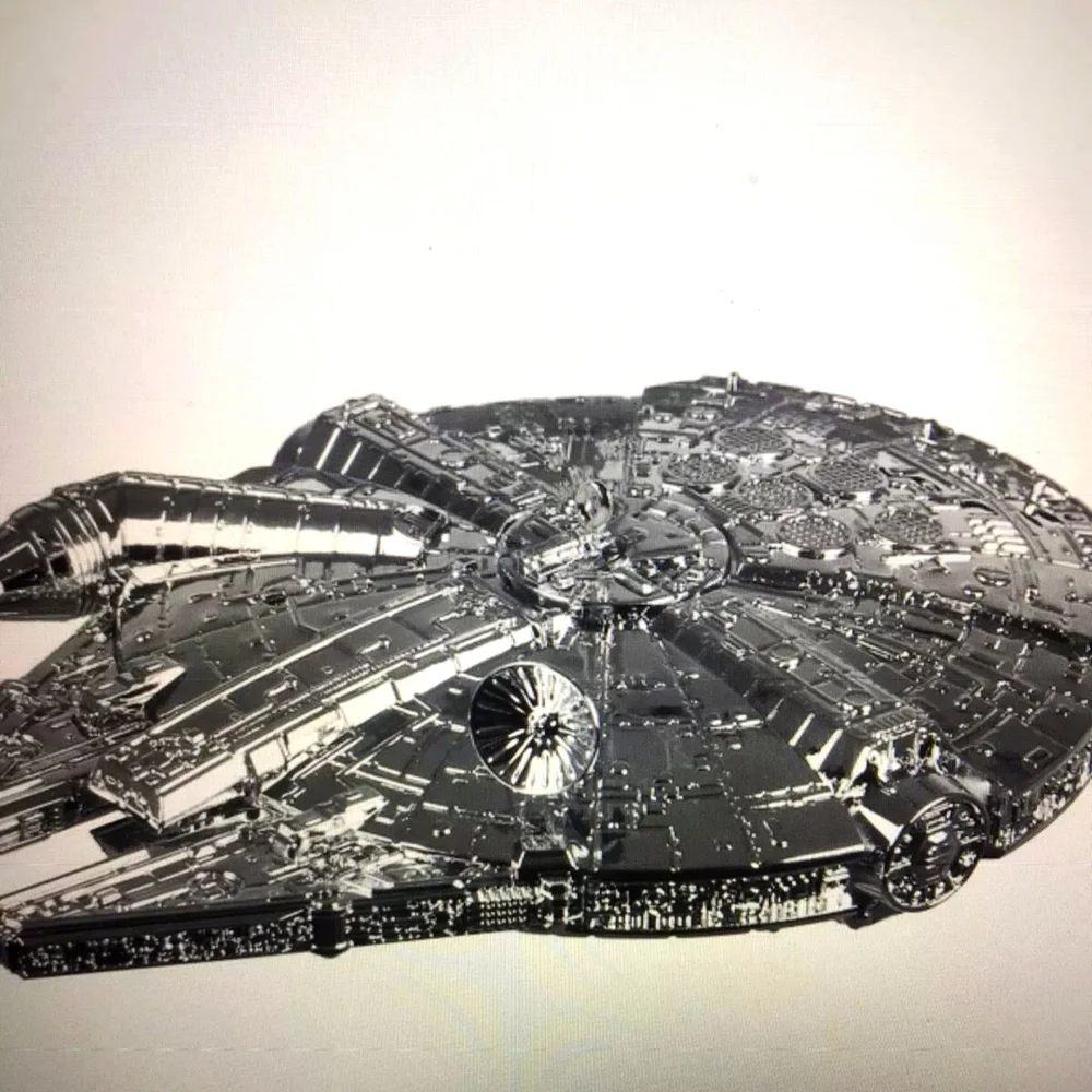 Millennium Falcon ornament, 2021 Hallmark new in Box.